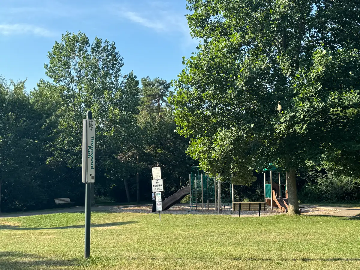 Thornwood Park sign and playground at 699 Thornwood Drive, Oakridge Park, London Ontario